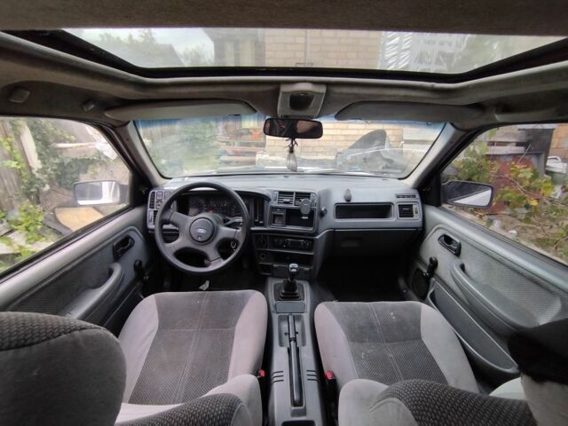 Белый Форд Сиерра, объемом двигателя 1.8 л и пробегом 1000 тыс. км за 700 $, фото 5 на Automoto.ua