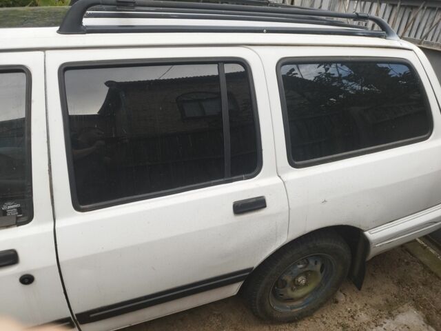 Белый Форд Сиерра, объемом двигателя 1.8 л и пробегом 1000 тыс. км за 700 $, фото 3 на Automoto.ua