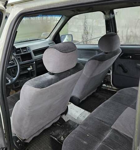 Білий Форд Сієрра, об'ємом двигуна 1.8 л та пробігом 68 тис. км за 1100 $, фото 8 на Automoto.ua