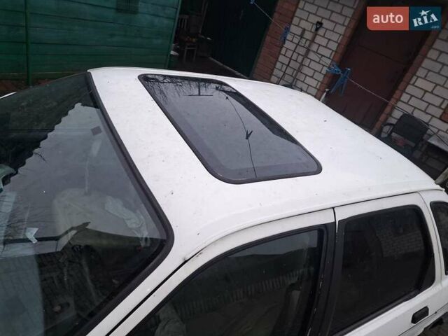 Білий Форд Сієрра, об'ємом двигуна 2 л та пробігом 300 тис. км за 500 $, фото 5 на Automoto.ua