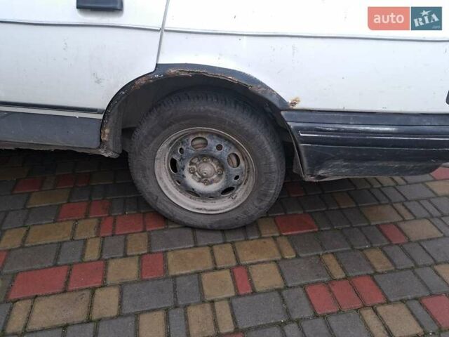 Білий Форд Сієрра, об'ємом двигуна 2 л та пробігом 300 тис. км за 500 $, фото 4 на Automoto.ua