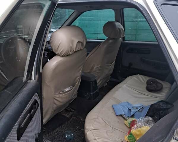 Білий Форд Сієрра, об'ємом двигуна 2 л та пробігом 300 тис. км за 500 $, фото 7 на Automoto.ua