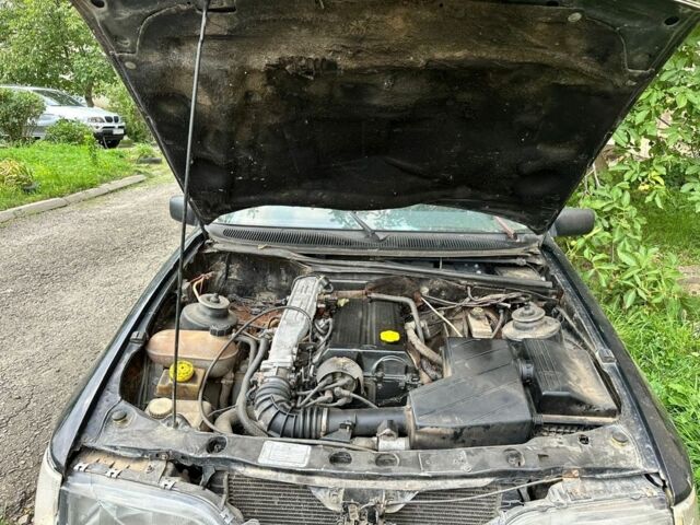 Черный Форд Сиерра, объемом двигателя 2 л и пробегом 285 тыс. км за 900 $, фото 1 на Automoto.ua