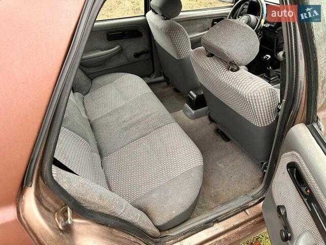 Коричневий Форд Сієрра, об'ємом двигуна 2 л та пробігом 230 тис. км за 750 $, фото 4 на Automoto.ua