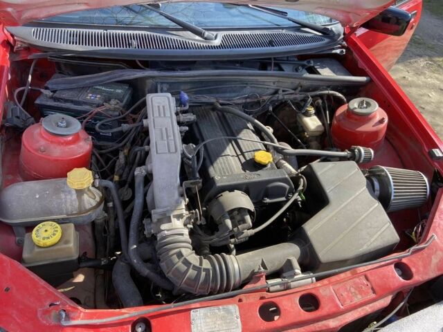 Красный Форд Сиерра, объемом двигателя 2 л и пробегом 100 тыс. км за 1900 $, фото 2 на Automoto.ua