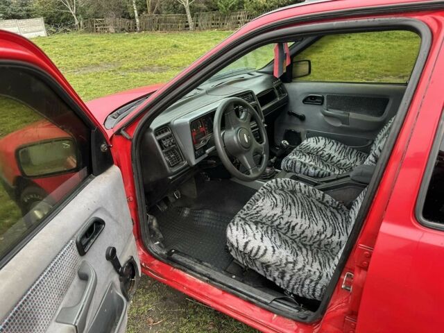 Красный Форд Сиерра, объемом двигателя 1.8 л и пробегом 300 тыс. км за 750 $, фото 3 на Automoto.ua