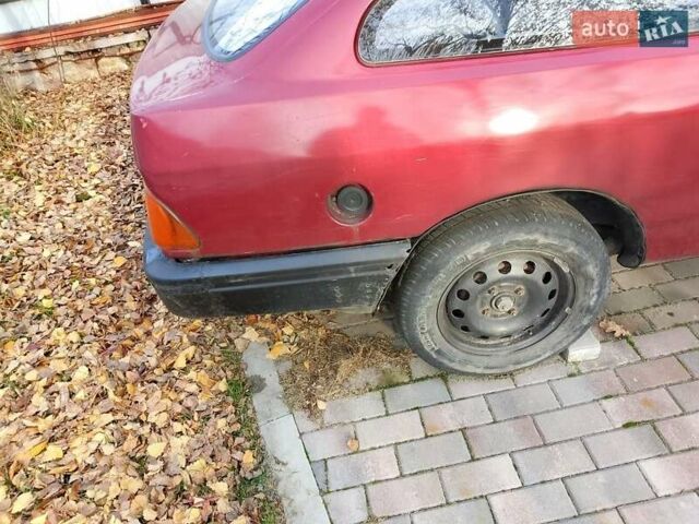Красный Форд Сиерра, объемом двигателя 1 л и пробегом 325 тыс. км за 600 $, фото 2 на Automoto.ua