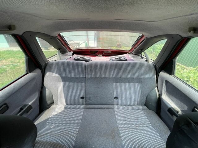 Красный Форд Сиерра, объемом двигателя 2 л и пробегом 200 тыс. км за 600 $, фото 6 на Automoto.ua