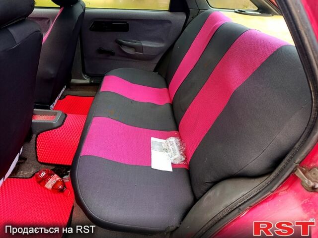 Червоний Форд Сієрра, об'ємом двигуна 2 л та пробігом 200 тис. км за 1200 $, фото 3 на Automoto.ua