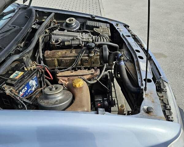 Серый Форд Сиерра, объемом двигателя 2 л и пробегом 390 тыс. км за 1150 $, фото 5 на Automoto.ua