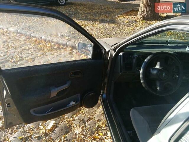 Серый Форд Сиерра, объемом двигателя 2 л и пробегом 222 тыс. км за 1100 $, фото 1 на Automoto.ua
