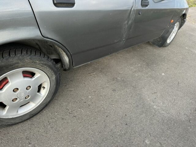 Сірий Форд Сієрра, об'ємом двигуна 2 л та пробігом 350 тис. км за 900 $, фото 4 на Automoto.ua