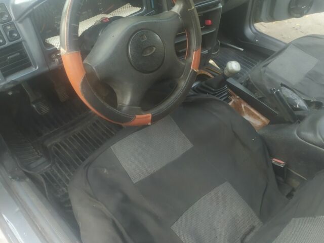 Серый Форд Сиерра, объемом двигателя 2 л и пробегом 777 тыс. км за 656 $, фото 3 на Automoto.ua