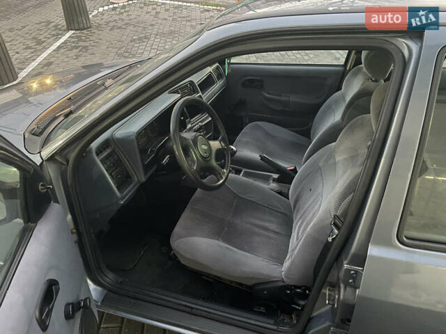 Серый Форд Сиерра, объемом двигателя 2 л и пробегом 169 тыс. км за 1750 $, фото 7 на Automoto.ua