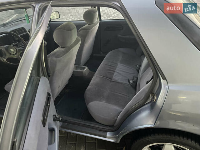 Серый Форд Сиерра, объемом двигателя 2 л и пробегом 169 тыс. км за 1750 $, фото 11 на Automoto.ua