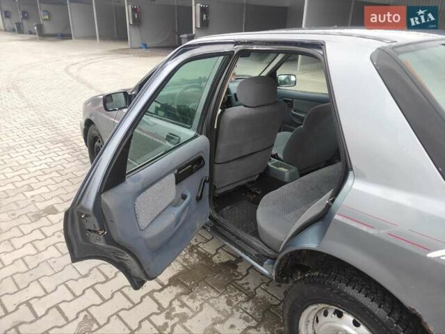 Сірий Форд Сієрра, об'ємом двигуна 2 л та пробігом 444 тис. км за 800 $, фото 9 на Automoto.ua
