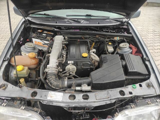 Серый Форд Сиерра, объемом двигателя 2 л и пробегом 450 тыс. км за 400 $, фото 4 на Automoto.ua