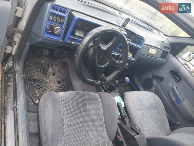 Серый Форд Сиерра, объемом двигателя 2 л и пробегом 150 тыс. км за 1400 $, фото 10 на Automoto.ua