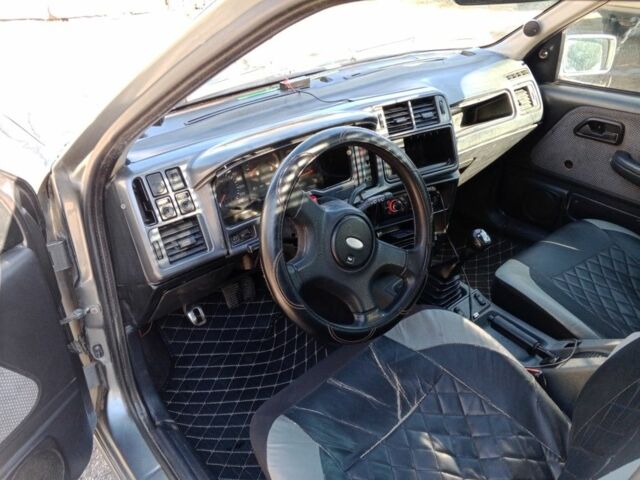 Серый Форд Сиерра, объемом двигателя 1.6 л и пробегом 1000 тыс. км за 1146 $, фото 3 на Automoto.ua