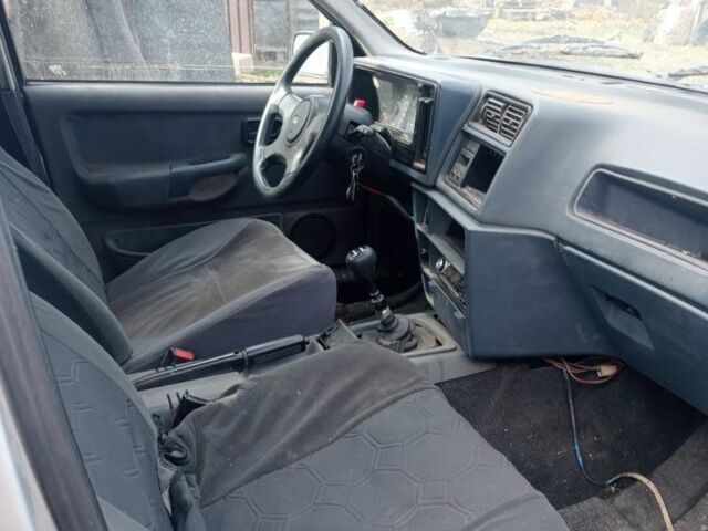 Серый Форд Сиерра, объемом двигателя 2 л и пробегом 62 тыс. км за 597 $, фото 4 на Automoto.ua