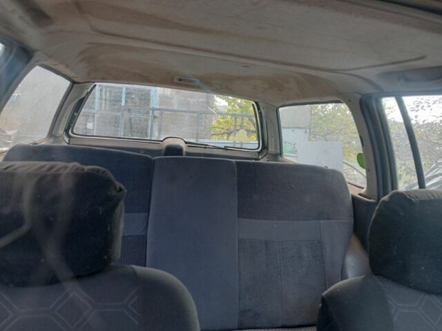 Серый Форд Сиерра, объемом двигателя 2 л и пробегом 62 тыс. км за 597 $, фото 5 на Automoto.ua