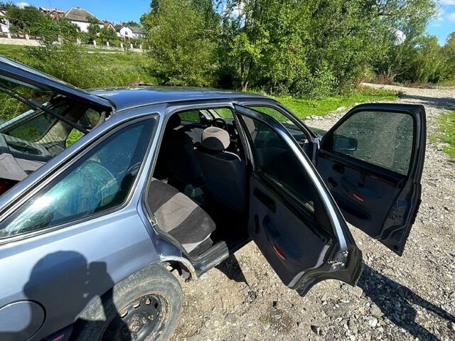 Сірий Форд Сієрра, об'ємом двигуна 2 л та пробігом 300 тис. км за 900 $, фото 3 на Automoto.ua
