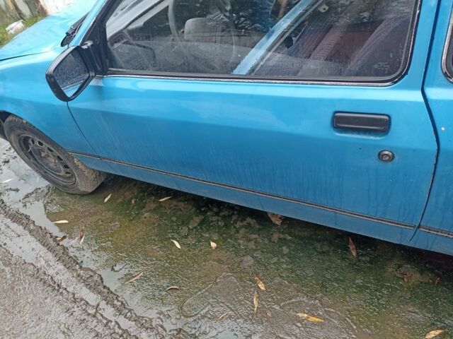 Синій Форд Сієрра, об'ємом двигуна 2 л та пробігом 142 тис. км за 400 $, фото 6 на Automoto.ua