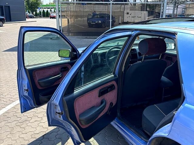 Синій Форд Сієрра, об'ємом двигуна 2 л та пробігом 300 тис. км за 1350 $, фото 4 на Automoto.ua