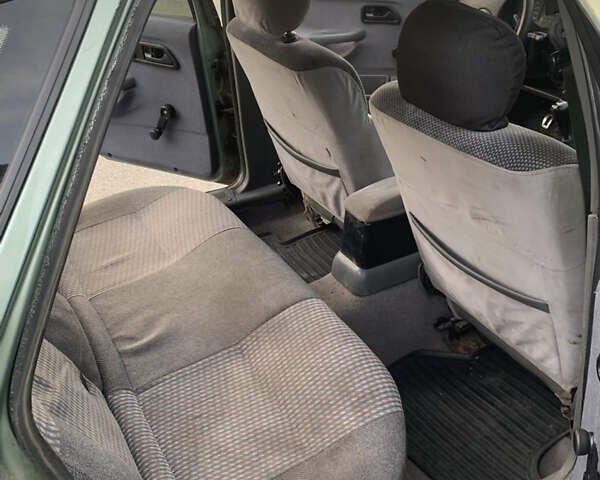 Зелений Форд Сієрра, об'ємом двигуна 1.8 л та пробігом 250 тис. км за 700 $, фото 11 на Automoto.ua