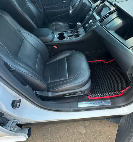 Білий Форд Taurus, об'ємом двигуна 3.73 л та пробігом 130 тис. км за 12350 $, фото 11 на Automoto.ua