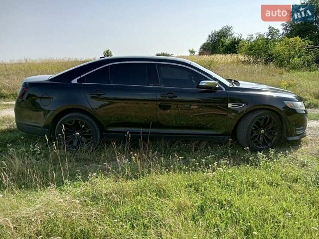 Черный Форд Таурус, объемом двигателя 2 л и пробегом 206 тыс. км за 11550 $, фото 4 на Automoto.ua