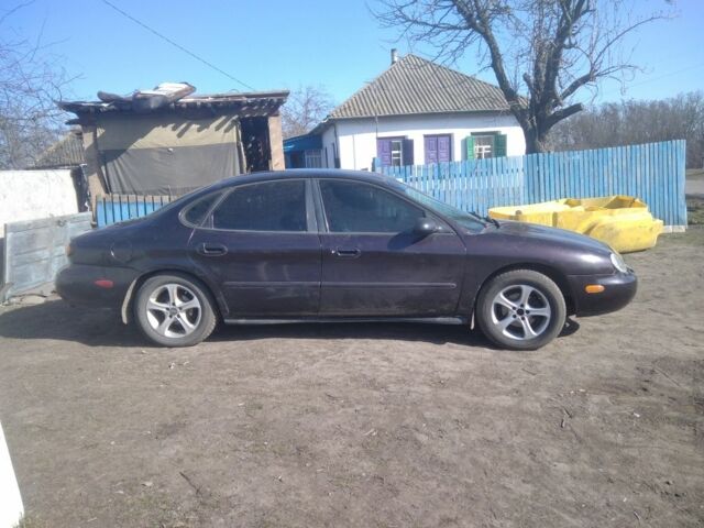 Фіолетовий Форд Taurus, об'ємом двигуна 3 л та пробігом 340 тис. км за 1650 $, фото 4 на Automoto.ua