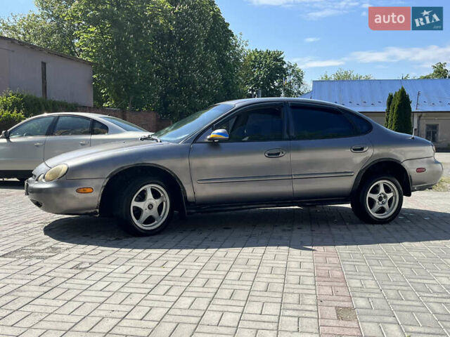 Фіолетовий Форд Taurus, об'ємом двигуна 3 л та пробігом 300 тис. км за 1750 $, фото 19 на Automoto.ua