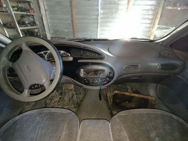 Сірий Форд Taurus, об'ємом двигуна 3 л та пробігом 358 тис. км за 650 $, фото 1 на Automoto.ua