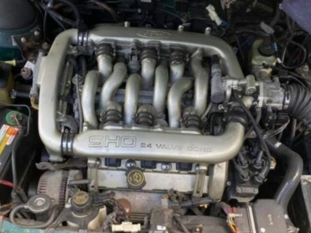 Зеленый Форд Таурус, объемом двигателя 3 л и пробегом 179 тыс. км за 800 $, фото 7 на Automoto.ua