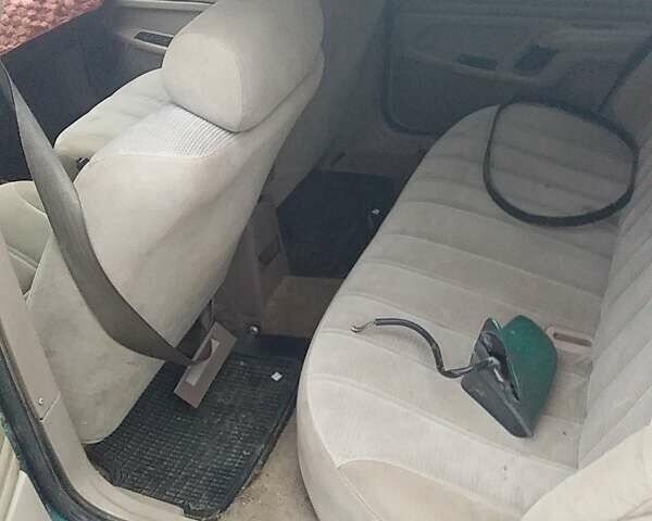 Зеленый Форд Темпо, объемом двигателя 2.45 л и пробегом 250 тыс. км за 1000 $, фото 3 на Automoto.ua