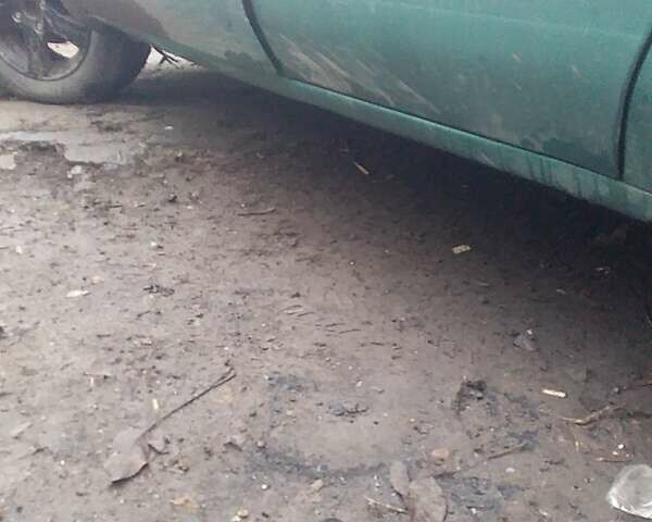 Зеленый Форд Темпо, объемом двигателя 2.45 л и пробегом 250 тыс. км за 1000 $, фото 1 на Automoto.ua