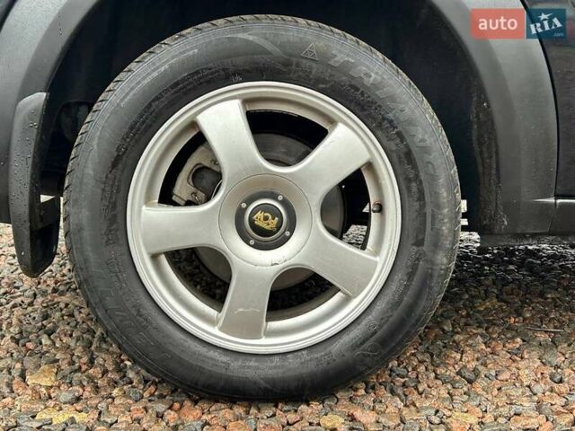 Черный Форд Турнео Коннект, объемом двигателя 1.8 л и пробегом 244 тыс. км за 7200 $, фото 33 на Automoto.ua