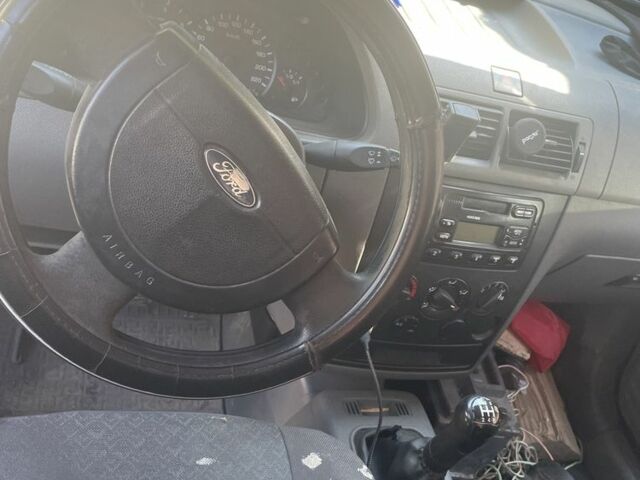 Серый Форд Турнео Коннект, объемом двигателя 1.9 л и пробегом 280 тыс. км за 4200 $, фото 1 на Automoto.ua