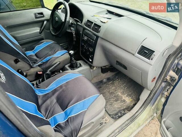 Синий Форд Турнео Коннект, объемом двигателя 1.8 л и пробегом 250 тыс. км за 1550 $, фото 8 на Automoto.ua