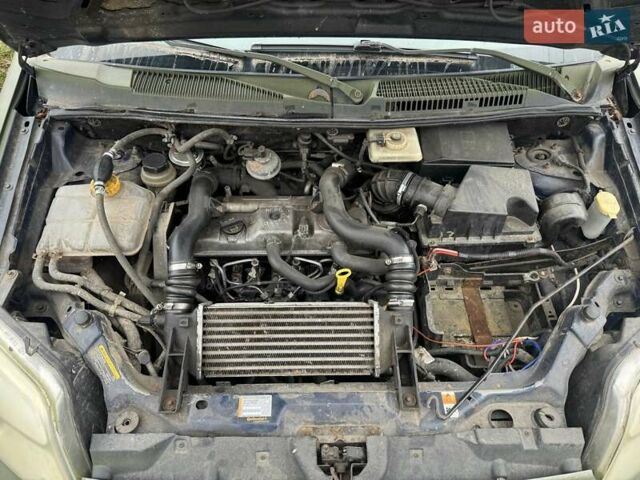 Синий Форд Турнео Коннект, объемом двигателя 1.8 л и пробегом 250 тыс. км за 1550 $, фото 9 на Automoto.ua