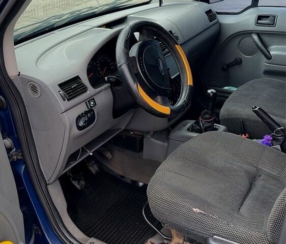 Синий Форд Турнео Коннект, объемом двигателя 1.8 л и пробегом 450 тыс. км за 4100 $, фото 7 на Automoto.ua