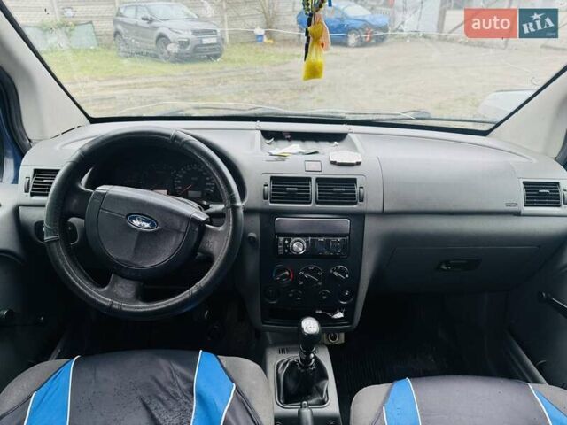 Синий Форд Турнео Коннект, объемом двигателя 1.8 л и пробегом 250 тыс. км за 1550 $, фото 6 на Automoto.ua