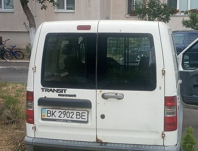 Білий Форд Транзит Коннект, об'ємом двигуна 1.8 л та пробігом 293 тис. км за 2600 $, фото 10 на Automoto.ua