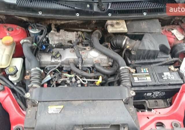 Красный Форд Транзит Коннект, объемом двигателя 1.75 л и пробегом 450 тыс. км за 3850 $, фото 4 на Automoto.ua