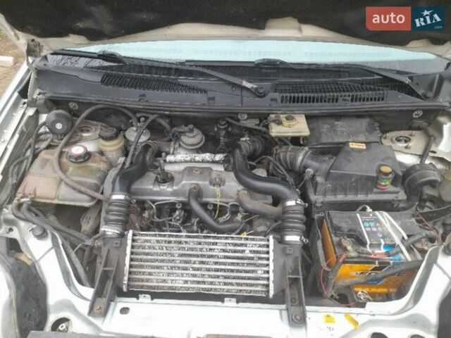 Серый Форд Транзит Коннект, объемом двигателя 1.8 л и пробегом 360 тыс. км за 3800 $, фото 11 на Automoto.ua