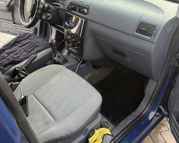 Синій Форд Транзит Коннект, об'ємом двигуна 1.8 л та пробігом 321 тис. км за 7000 $, фото 14 на Automoto.ua