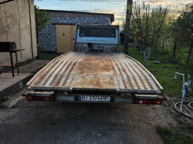 Білий Форд Транзит, об'ємом двигуна 2.4 л та пробігом 400 тис. км за 10399 $, фото 1 на Automoto.ua