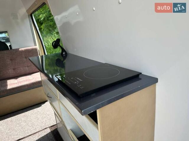 Белый Форд Транзит, объемом двигателя 2.4 л и пробегом 333 тыс. км за 15000 $, фото 1 на Automoto.ua