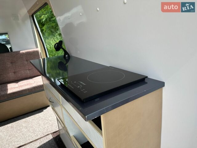 Білий Форд Транзит, об'ємом двигуна 2.4 л та пробігом 350 тис. км за 12400 $, фото 10 на Automoto.ua
